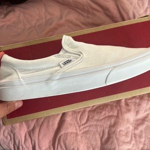 White slip on vans